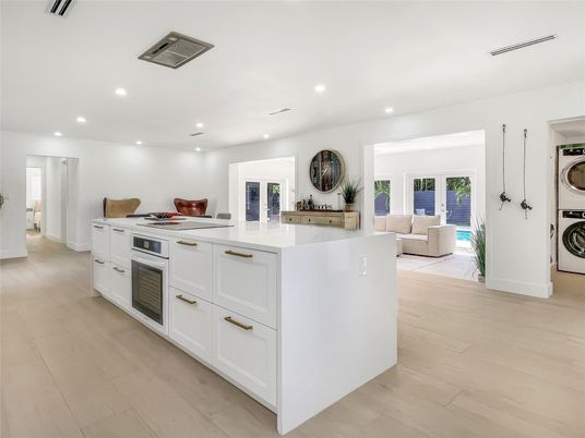 Interior, Kitchen, Living room, Recessed Lighting, Washer, Wood Texture Flooring