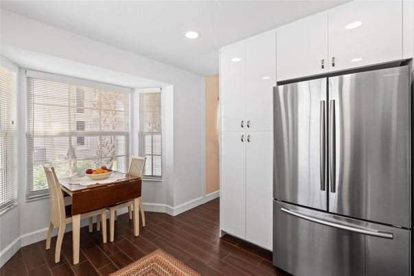 Dining room, Interior, Kitchen, Recessed Lighting, Stainless Steel Appliances, Wood Texture Flooring