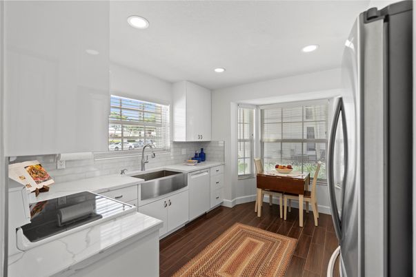 Dining room, Interior, Kitchen, Recessed Lighting, Stainless Steel Appliances, Wood Texture Flooring