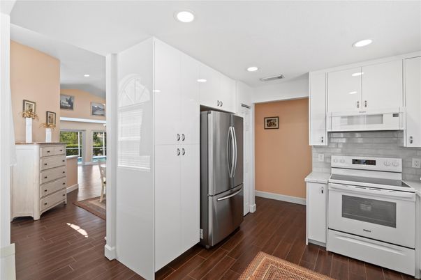 Interior, Kitchen, Recessed Lighting, Stainless Steel Appliances, Wood Texture Flooring