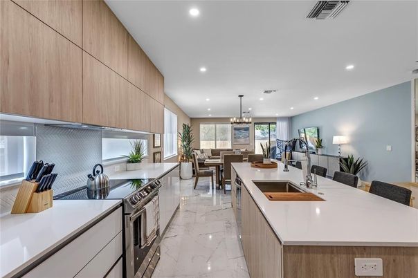 Chandelier, Dining room, Interior, Kitchen, Marble, Pendant Lights, Recessed Lighting, Stainless Steel Appliances
