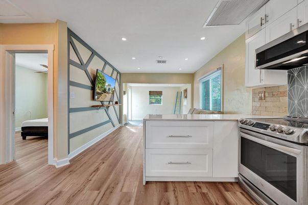 Interior, Kitchen, Recessed Lighting, Stainless Steel Appliances, Wood Texture Flooring