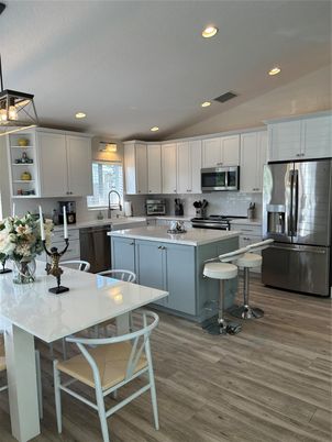 Interior, Kitchen, Recessed Lighting, Stainless Steel Appliances, Wood Texture Flooring
