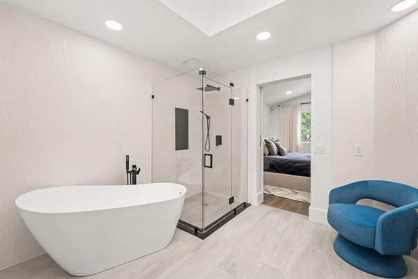Bathroom, Free Standing Baths, Glass Shower, Interior, Recessed Lighting, Wood Texture Flooring