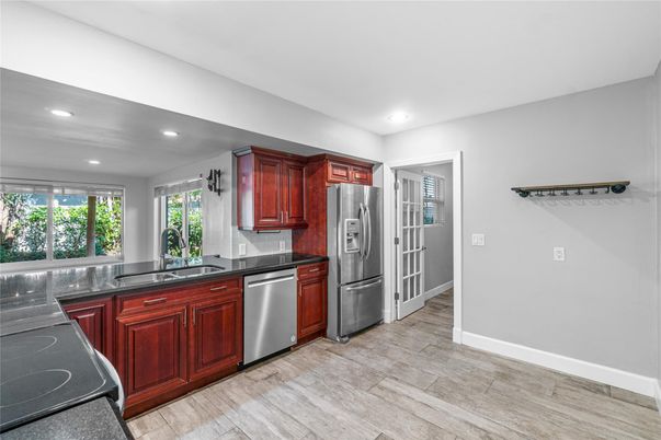 Interior, Kitchen, Recessed Lighting, Stainless Steel Appliances, Wood Texture Flooring