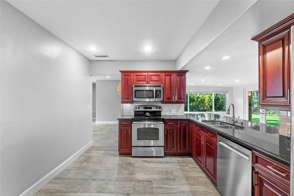 Interior, Kitchen, Recessed Lighting, Stainless Steel Appliances, Wood Texture Flooring