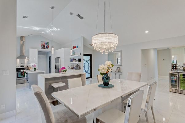 Chandelier, Dining room, Interior, Kitchen, Marble, Pendant Lights, Recessed Lighting, Stainless Steel Appliances
