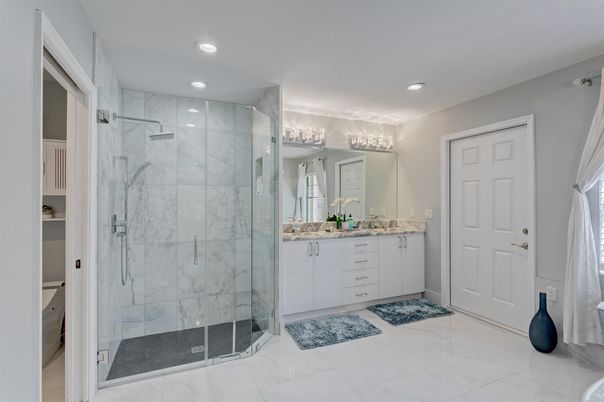 Bathroom, Dual Sink Vanities, Glass Shower, Interior, Marble, Marble Walls, Recessed Lighting