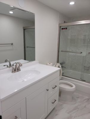 Bathroom, Dual Sink Vanities, Glass Shower, Interior, Marble, Recessed Lighting