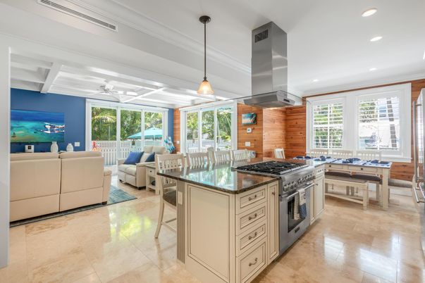 Dining room, Interior, Kitchen, Living room, Pendant Lights, Recessed Lighting, Stainless Steel Appliances, Wooden Walls