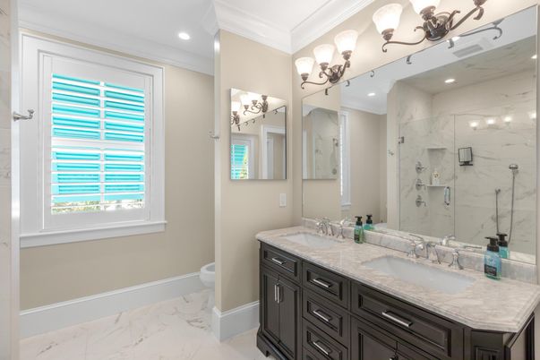 Bathroom, Dual Sink Vanities, Glass Shower, Interior, Marble, Marble Walls, Recessed Lighting