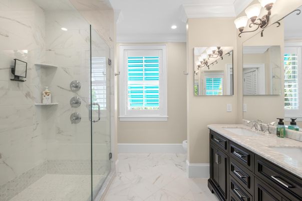 Bathroom, Dual Sink Vanities, Glass Shower, Interior, Marble, Marble Walls, Recessed Lighting