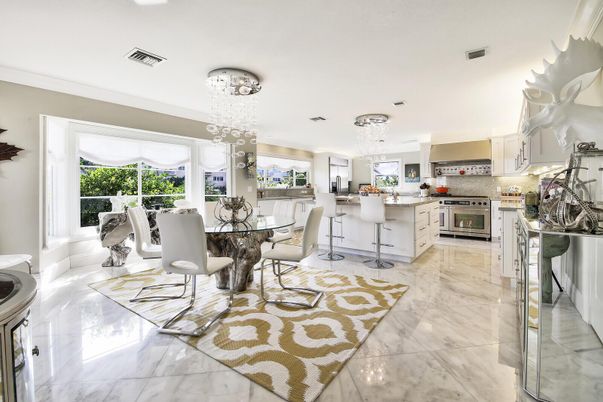 Chandelier, Dining room, Interior, Kitchen, Marble, Pendant Lights, Recessed Lighting, Stainless Steel Appliances