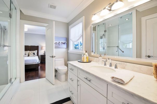 Bathroom, Bedroom, Dual Sink Vanities, Glass Shower, Interior, Wood Texture Flooring