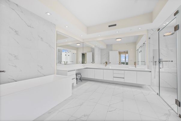 Bathroom, Dual Sink Vanities, Glass Shower, Interior, Marble, Marble Walls, Recessed Lighting