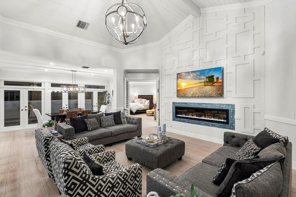 Chandelier, Dining room, Fireplace, Interior, Living room, Pendant Lights, Recessed Lighting, Wood Texture Flooring