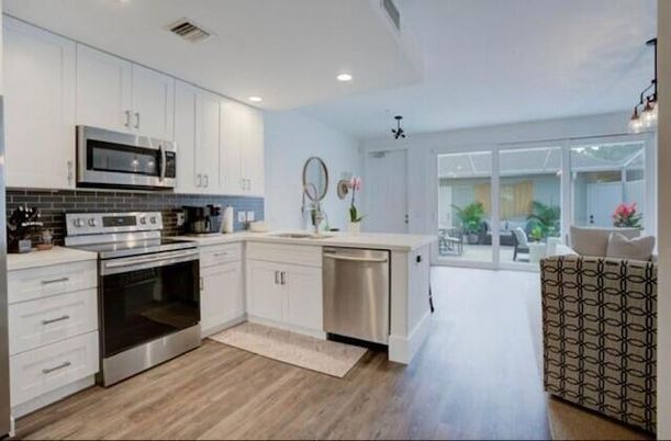 Interior, Kitchen, Pendant Lights, Recessed Lighting, Stainless Steel Appliances, Wood Texture Flooring