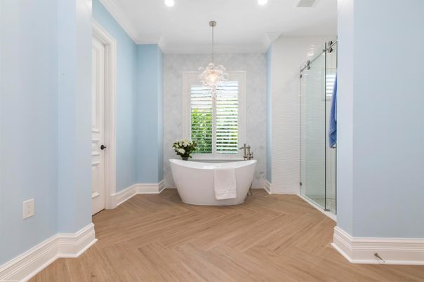 Bathroom, Chandelier, Free Standing Baths, Glass Shower, Interior, Recessed Lighting, Wood Texture Flooring