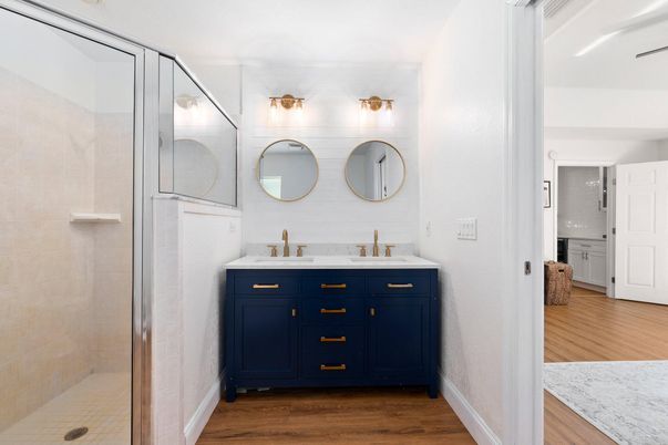 Bathroom, Dual Sink Vanities, Glass Shower, Interior, Wood Texture Flooring