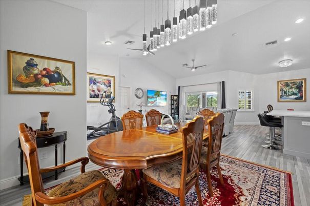 Dining room, Fitness Equipment, Interior, Pendant Lights, Recessed Lighting, Wood Texture Flooring