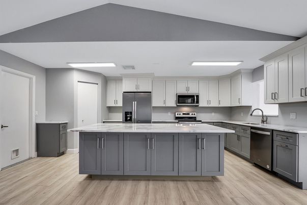 Interior, Kitchen, Recessed Lighting, Stainless Steel Appliances, Wood Texture Flooring