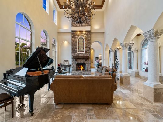 Chandelier, Fireplace, Interior, Living room, Piano, Stone Walls