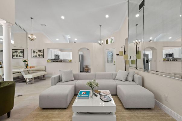 Chandelier, Dining room, Interior, Kitchen, Living room, Pendant Lights, Recessed Lighting, Stainless Steel Appliances, Wood Texture Flooring