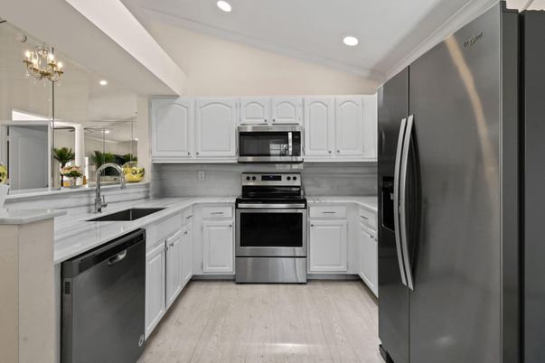 Interior, Kitchen, Recessed Lighting, Stainless Steel Appliances, Wood Texture Flooring