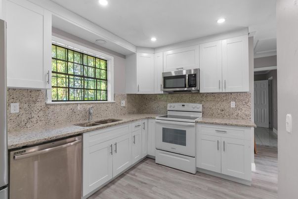 Interior, Kitchen, Recessed Lighting, Stainless Steel Appliances, Wood Texture Flooring
