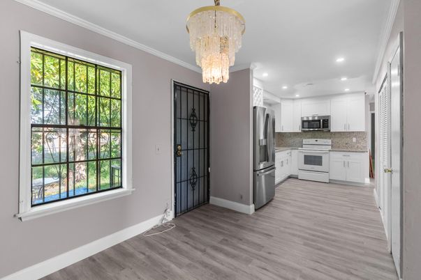 Chandelier, Interior, Kitchen, Recessed Lighting, Stainless Steel Appliances, Wood Texture Flooring