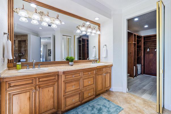 Bathroom, Dual Sink Vanities, Interior, Recessed Lighting, Walk-in Closets