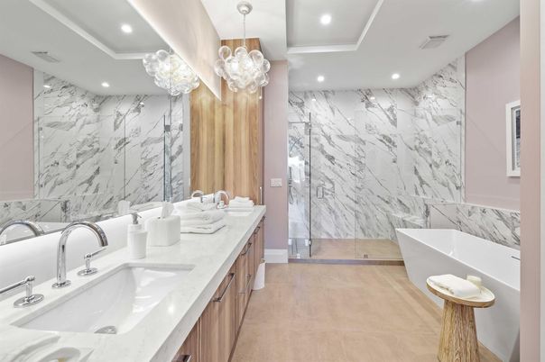 Bathroom, Dual Sink Vanities, Free Standing Baths, Glass Shower, Interior, Marble, Marble Walls, Pendant Lights, Recessed Lighting