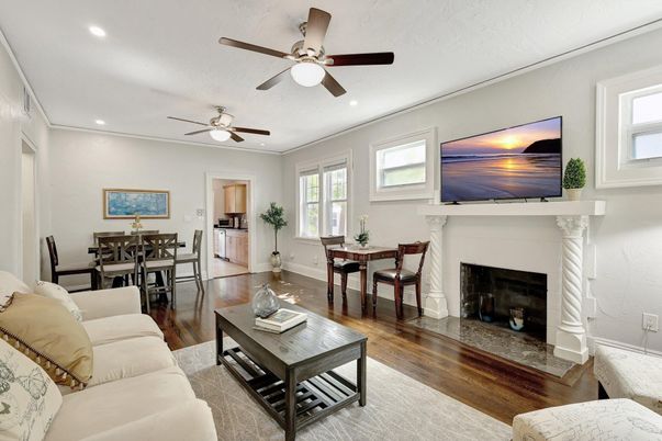 Dining room, Fireplace, Interior, Living room, Recessed Lighting, Wood Texture Flooring