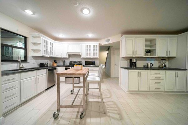 Dining room, Interior, Kitchen, Recessed Lighting, Stainless Steel Appliances, Wood Texture Flooring