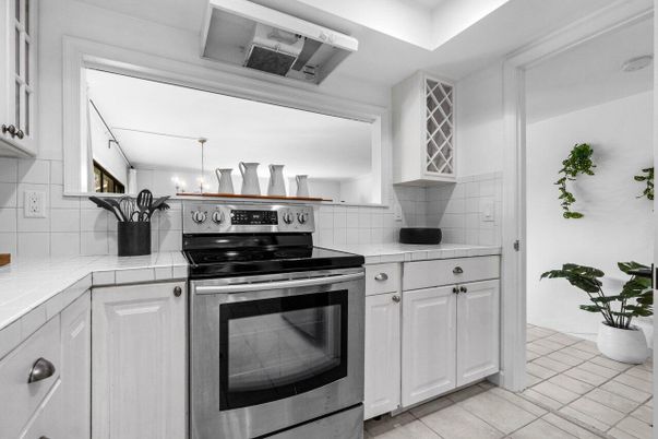 Interior, Kitchen, Pendant Lights, Stainless Steel Appliances, Tile Countertops