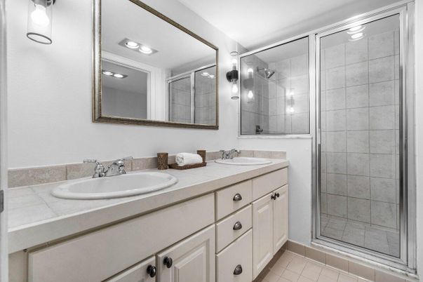 Bathroom, Dual Sink Vanities, Glass Shower, Interior, Recessed Lighting, Tile Countertops
