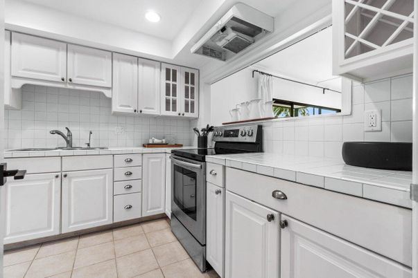 Interior, Kitchen, Recessed Lighting, Tile Countertops
