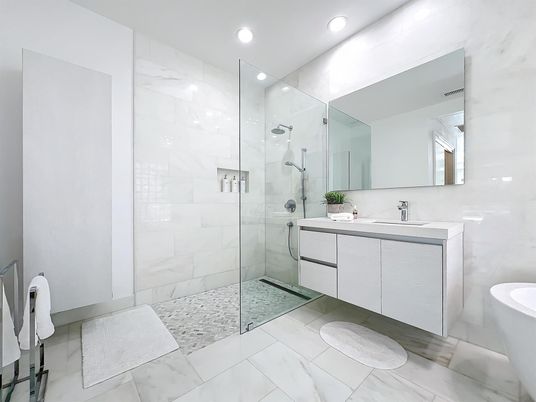 Bathroom, Dual Sink Vanities, Glass Shower, Interior, Marble, Marble Walls, Recessed Lighting