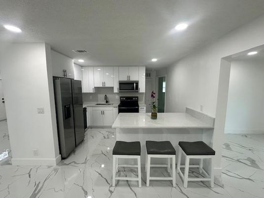 Interior, Kitchen, Marble, Recessed Lighting, Stainless Steel Appliances