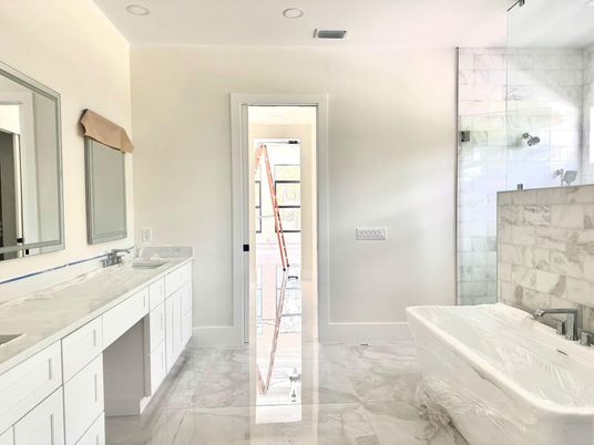 Bathroom, Dual Sink Vanities, Glass Shower, Interior, Marble, Marble Walls, Recessed Lighting