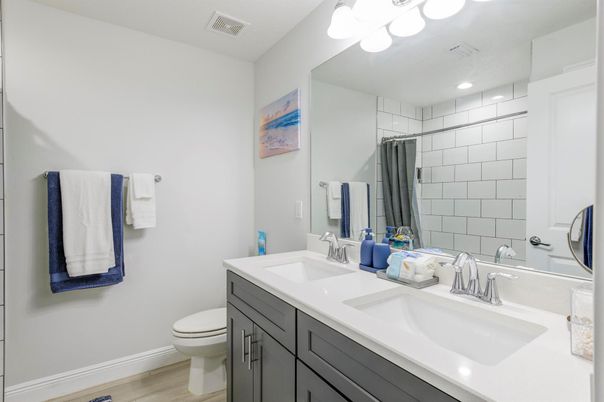 Bathroom, Dual Sink Vanities, Interior, Recessed Lighting, Wood Texture Flooring
