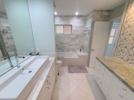 Bathroom, Dual Sink Vanities, Glass Shower, Interior, Marble, Recessed Lighting