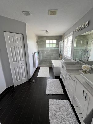 Bathroom, Dual Sink Vanities, Free Standing Baths, Glass Shower, Interior, Wood Texture Flooring