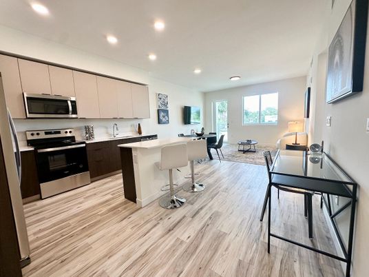 Dining room, Interior, Kitchen, Recessed Lighting, Stainless Steel Appliances, Wood Texture Flooring
