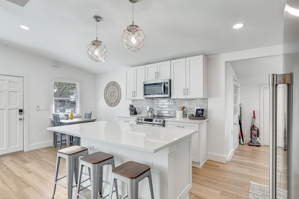Interior, Kitchen, Pendant Lights, Recessed Lighting, Stainless Steel Appliances, Wood Texture Flooring