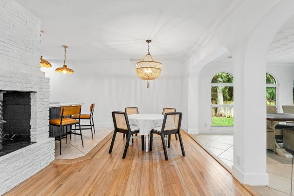 Dining room, Fireplace, Interior, Pendant Lights, Stone Walls, Wood Texture Flooring