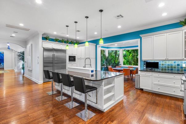Dining room, Interior, Kitchen, Pendant Lights, Recessed Lighting, Stainless Steel Appliances, Wood Texture Flooring