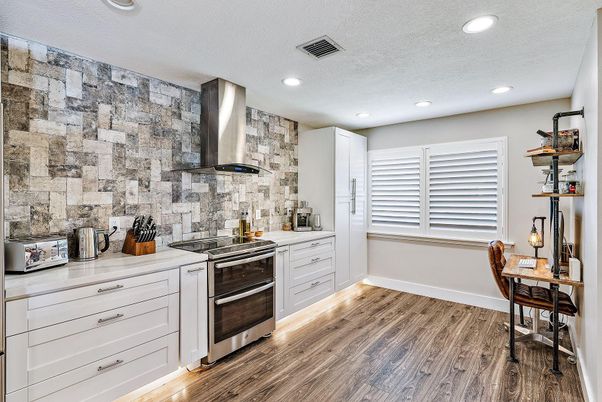 Interior, Kitchen, Recessed Lighting, Stainless Steel Appliances, Stone Walls, Wood Texture Flooring
