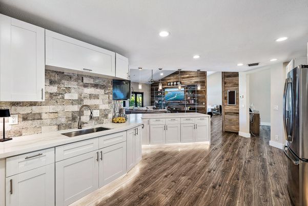Interior, Kitchen, Recessed Lighting, Stainless Steel Appliances, Stone Walls, Wood Texture Flooring