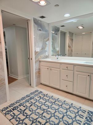Bathroom, Dual Sink Vanities, Glass Shower, Interior, Marble Walls, Recessed Lighting